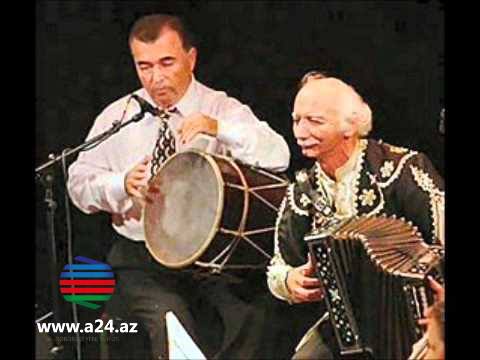 "Ana layla"sı ilə dünyanı ağladan, qarmonuyla İrana qarşı savaşan Rəhman Əsədullahi kimdir? - FOTOLAR