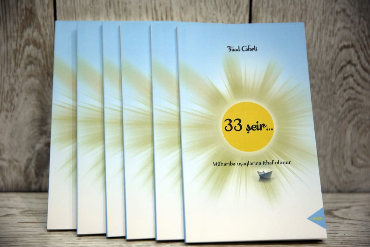 Prezident təqaüdçüsü müharibə uşaqlarına kitab həsr etdi